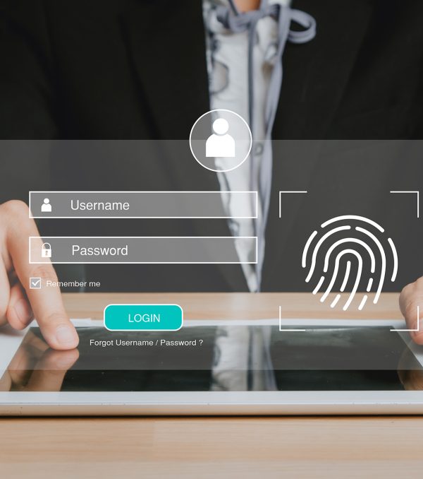 Person hand typing on digital tablet with login and password and fingerprint on screen display, cyber security concept, data protection and secured internet access.